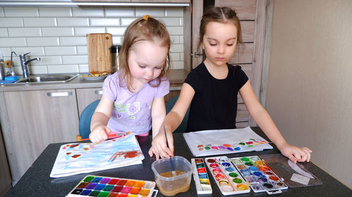 Mother and daughter at home