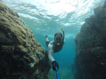 Man swimming in sea