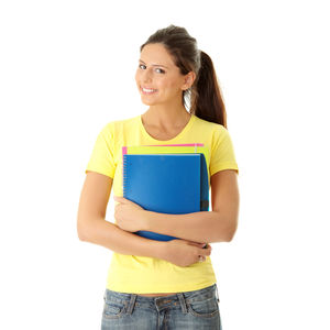 Portrait of smiling young woman against white background