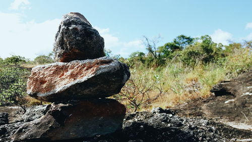 Close-up of rock against sky