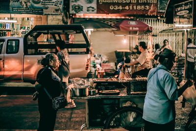 People on street in city