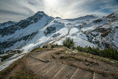 Scenic view of snowcapped mountains against sky