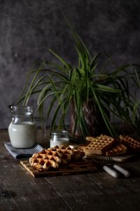 Coffee beans in jar on table