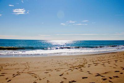 Scenic view of beach against sky