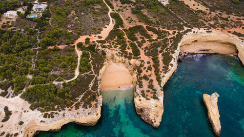 High angle view of rock on sea