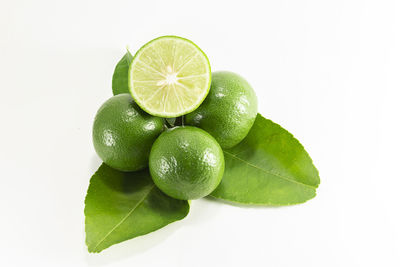 Close-up of fruits against white background