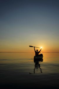 Scenic view of sea at sunset