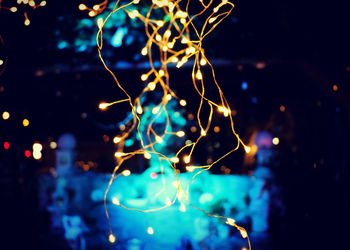 Close-up of illuminated christmas tree at night