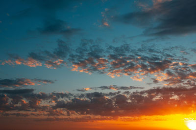 Low angle view of clouds in sky during sunset