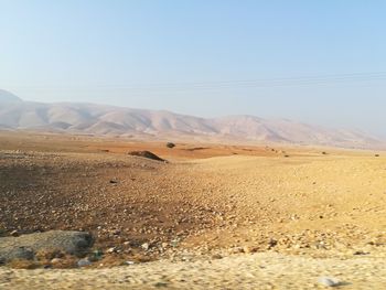 Scenic view of desert against sky