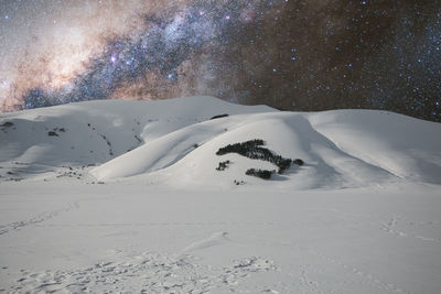 Scenic view of snow covered landscape