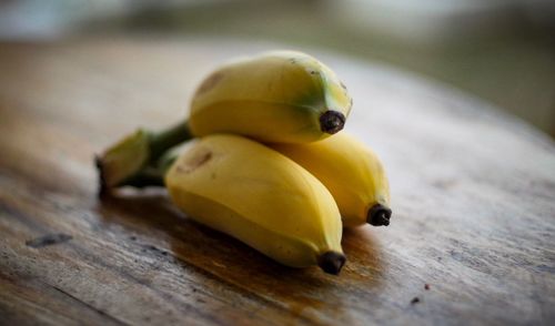 Close-up of yellow fruit on table