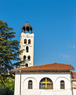 Low angle view of building against blue sky