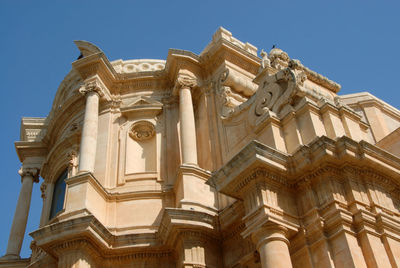 Low angle view of historical building against clear sky