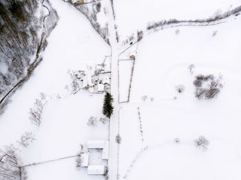 Aerial view of snow covered field 