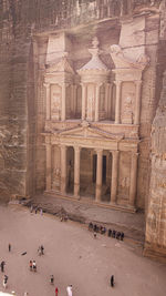 Group of people in front of historical building