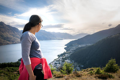 Woman standing on mountain