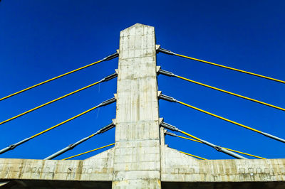 Low angle view of built structure against blue sky