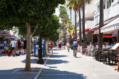 People on street in city