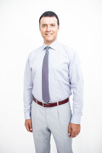 Portrait of a smiling mid adult over white background