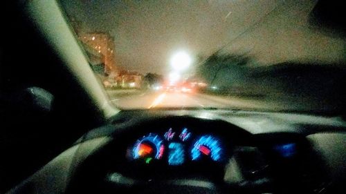Close-up of hand seen through airplane window