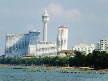 Buildings in city against sky