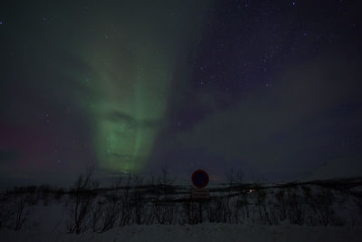 Scenic view of aurora borealis at ullsfjorden