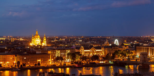 Illuminated buildings in city at night