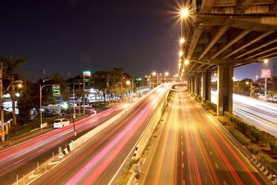 Light trails on city street at night