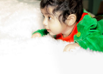 Portrait of cute boy with toy