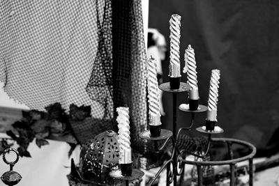Close-up of illuminated lighting equipment on table