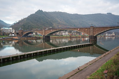 Bridge over river against sky