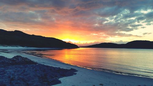 Scenic view of mountains at sunset