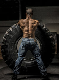 Rear view of body builder