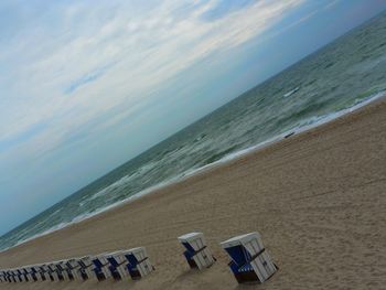 Scenic view of beach against sky