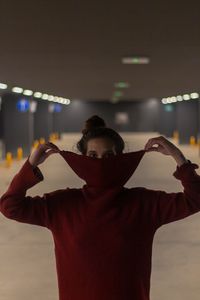 Portrait of woman standing in subway