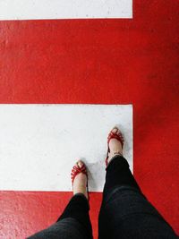 Low section of woman standing on floor