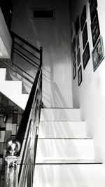 Low angle view of illuminated staircase in building