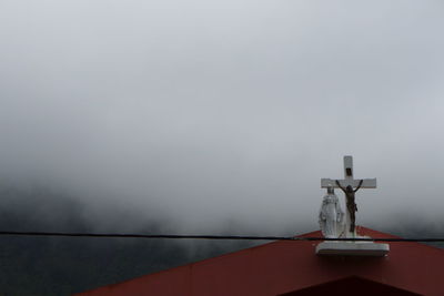 Close-up of column against sky