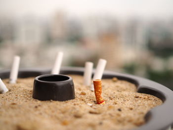 Close-up of cigarette on table