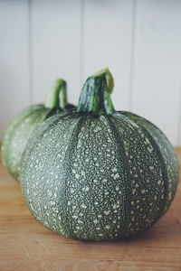 Close-up of squashes on table