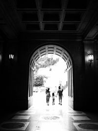 People walking in tunnel