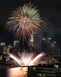 Firework display at night