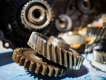 Close-up of machine gears on table