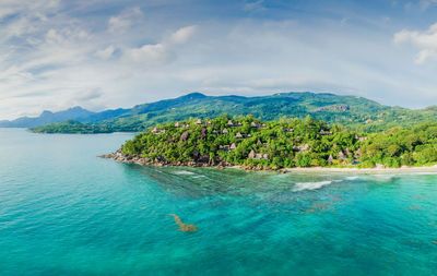 Scenic view of sea against sky. anse boileau. mahe island, seychelles