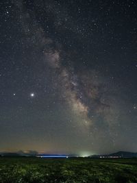 Scenic view of star field against sky at night