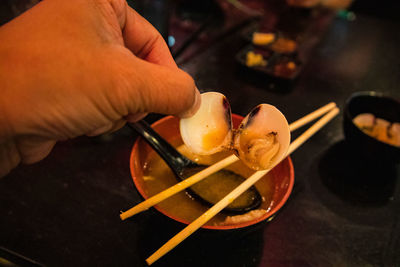 Cropped hand of person holding ice cream