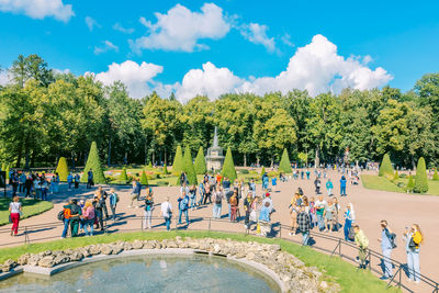 High angle view of people at beach against sky