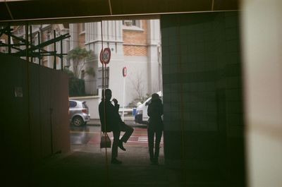 Reflection of people on glass