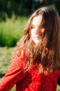 Close-up of teenage girl with brown hair